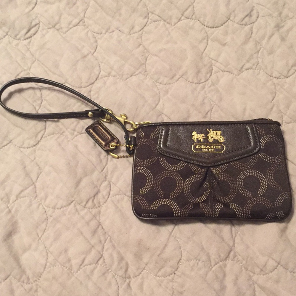 Brown Coach Wristlet with gold details